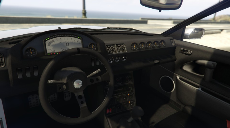 Interior view with digital instrument cluster.
